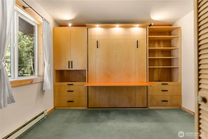Guest bedroom or Office. Deluxe Murphy bed creates great versatility.