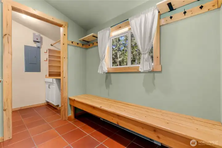 Mud room entry with heated bench.