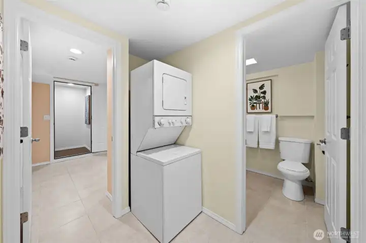 The second washer and dryer units can be  private to the ADU by simply closing one door. The open-door layout makes this utility zone easy to navigate and surprisingly practical.