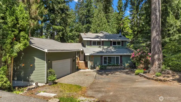 looking north at the house and garage