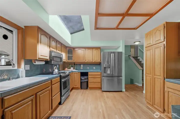 Looking east into kitchen area.