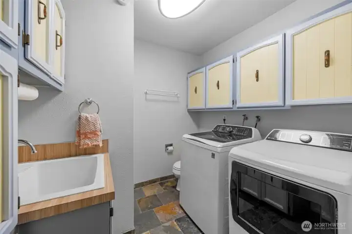 Laundry room lower level half bath also. Storage too.