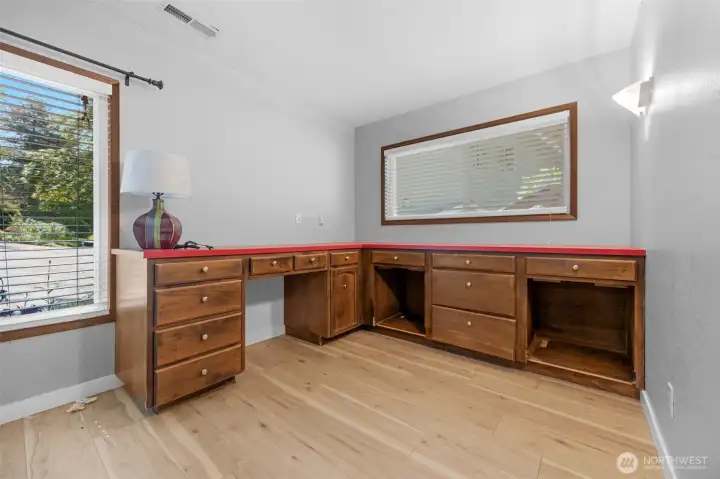 Extra den, study area or good for crafts.
