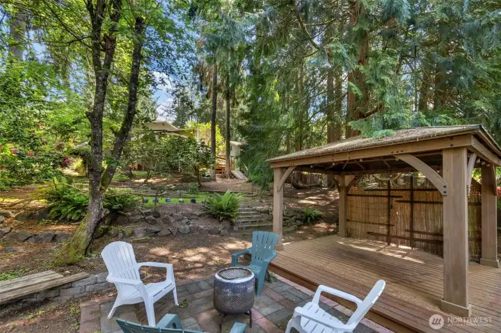 The westerly part of the yard. Gazebo and conversation area. Great place for family, friends parklike gathering.
