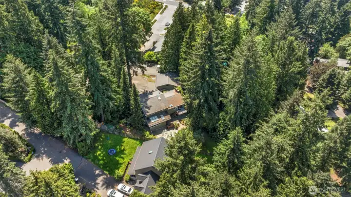 Looking down at the north side of the home. Patio area