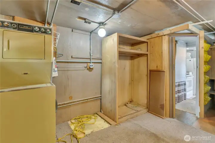 Main floor laundry area and storage