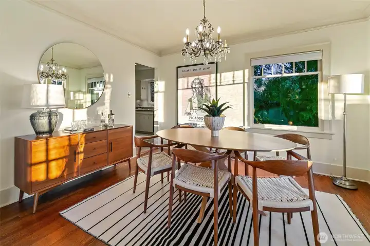 Expansive dining room faces the views and provides ample space for a large table and sideboard.