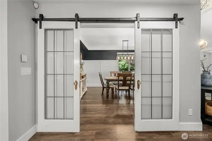 Authentic barn doors to reveal the grand private dining room. Authentic barn doors to reveal the grand private dining room.