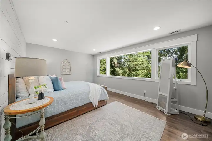 Primary Bedroom, a private sanctuary with a view of Lake Wilderness Primary Bedroom, a private sanctuary with a view of Lake Wilderness