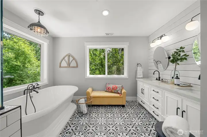 Primary Spa Bathroom, including a beautiful soaking tub, tiled walk-in shower and double vanity and natural light from the large windows. Primary Spa Bathroom, including a beautiful soaking tub, tiled walk-in shower and double vanity and natural light from the large windows.
