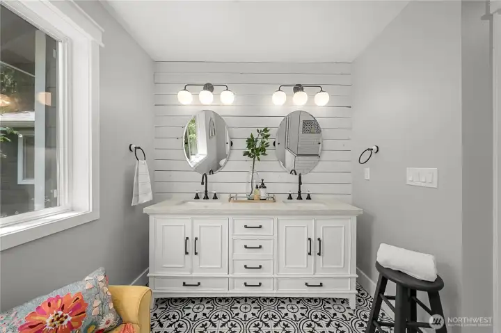 Primary bathroom vanity with plenty of storage and natural light Primary bathroom vanity with plenty of storage and natural light