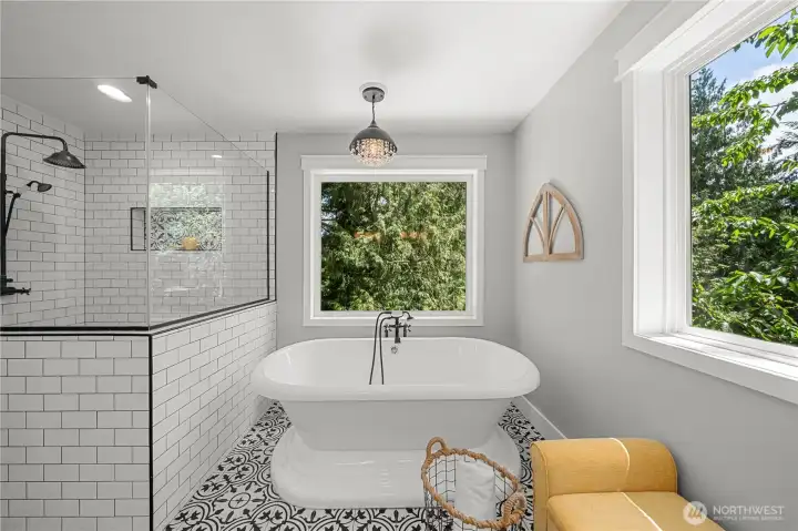 A spa in your own home, soaking tub with a view. And a custom tiled walk-in shower for those morning routines. A spa in your own home, soaking tub with a view. And a custom tiled walk-in shower for those morning routines.