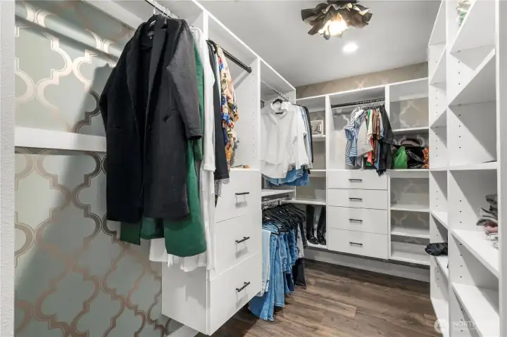 Primary walk-in closet, custom cabinets Primary walk-in closet, custom cabinets