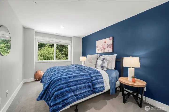 Upstairs Bedroom #1, with a beautiful blue hue accent wall and custom closet. Upstairs Bedroom #1, with a beautiful blue hue accent wall and custom closet.