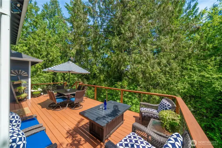 Peaceful wooded setting, the perfect backdrop for gatherings or your morning coffee. Peaceful wooded setting, the perfect backdrop for gatherings or your morning coffee.