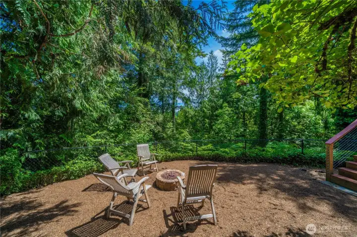 Fenced in back yard with a firepit area, for your family to enjoy our perfect evening settings. Fenced in back yard with a firepit area, for your family to enjoy our perfect evening settings.