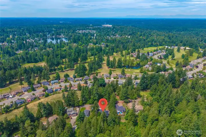 Aerial view showcasing the Lake Wilderness Golf Course. Sitting across the road is the eleventh green and tee box for hole #12. The three stall garage will host your golf cart for you to enjoy many rounds! Aerial view showcasing the Lake Wilderness Golf Course. Sitting across the road is the eleventh green and tee box for hole #12. The three stall garage will host your golf cart for you to enjoy many rounds!