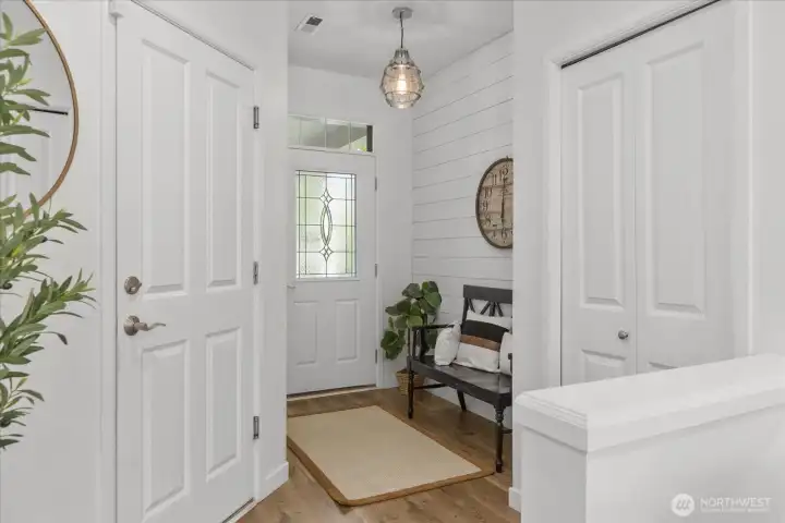 Welcoming Entry with Architectural Shiplap detail and LVP flooring