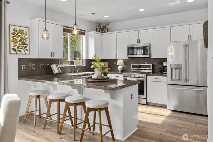 Large Kitchen Island open to dining/kitchen and living areas