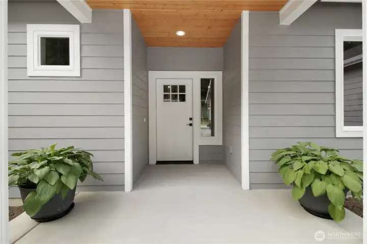 Spacious front patio is covered with exposed wood ceilings for the rustic touch our hearts desire. Spacious front patio is covered with exposed wood ceilings for the rustic touch our hearts desire.