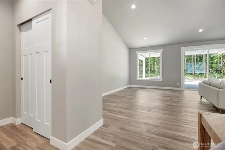 simple and sleek entry. To the left there is space for shoes and a great coat closet! simple and sleek entry. To the left there is space for shoes and a great coat closet!