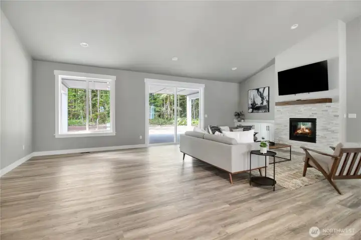 vaulted ceilings with central propane fireplace create an inviting feel. vaulted ceilings with central propane fireplace create an inviting feel.