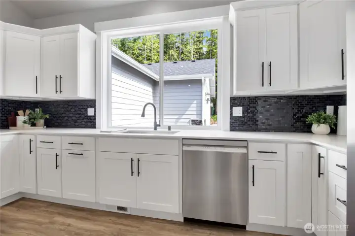 who doesn't love a bay window at the kitchen sink!! This creates a beautiful window that looks out over the front entry. who doesn't love a bay window at the kitchen sink!! This creates a beautiful window that looks out over the front entry.