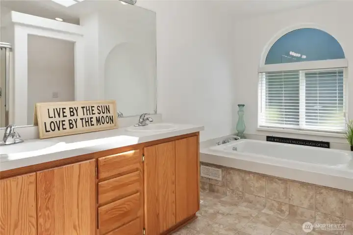 primary ensuite 5-piece bathroom. New tub! Updated plumbing throughout the home.