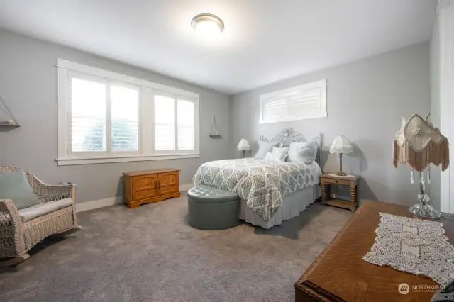 Retreat to the large primary bedroom on the main level.