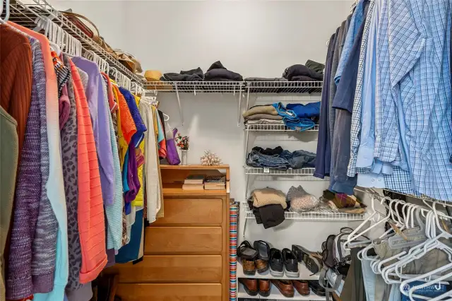 Primary bedroom walk in closet