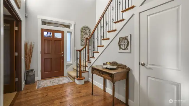 A welcoming entrance featuring wood-accented details, setting a cozy and inviting tone.