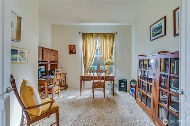 Office with solid wood doors.