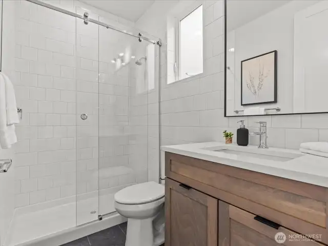 Main level bathroom with heated floors!