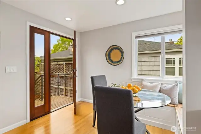 French doors off the breakfast nook lead to the deck—perfect for coffee al fresco or summer dining.
