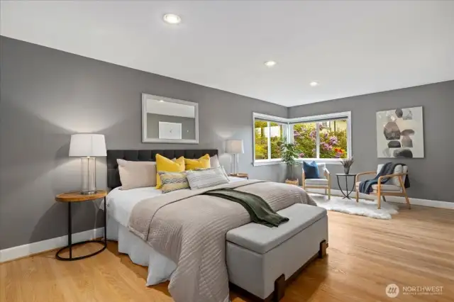 This generous suite offers room to relax, recharge, and enjoy garden views from your sitting nook.