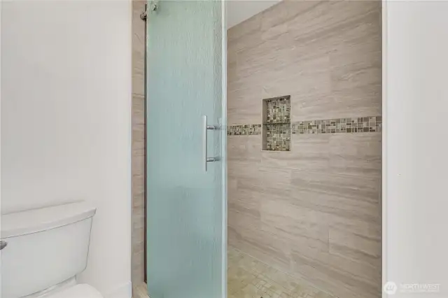 Separate shower in the primary bath.