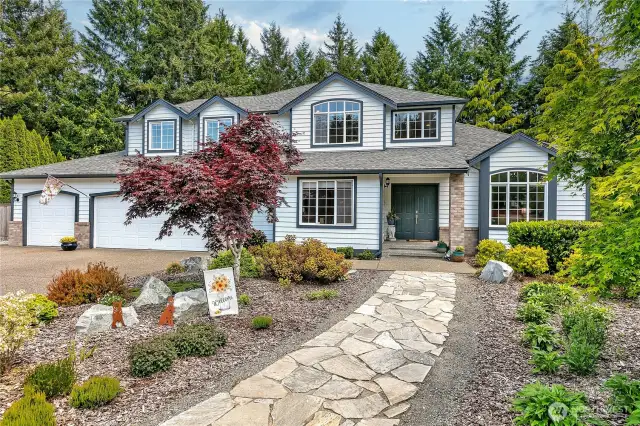 This home features 4 bedrooms, 2.75 baths, and 2,402 sq. ft. of beautifully designed living space.