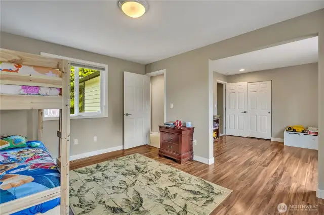 Adjoining the additional bedroom is a bonus room.
