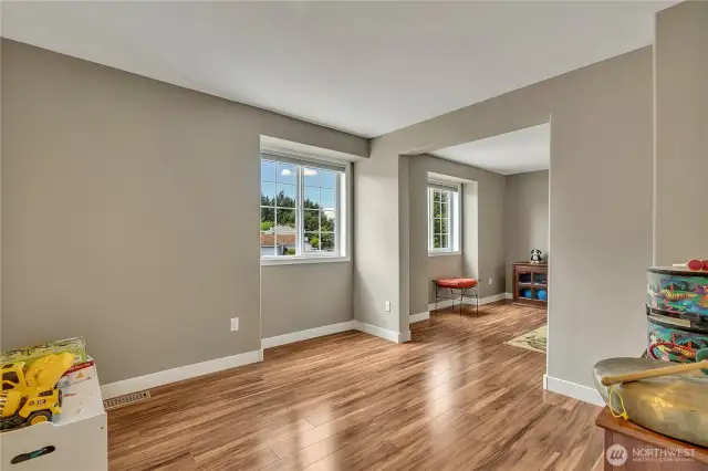 Bonus room that adjoins an additional bedroom.