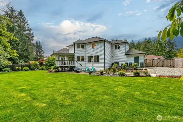 Back exterior with inviting outdoor spaces.