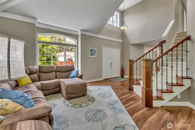Relax or entertain in the formal living room with a large designer window that lets in the natural light.