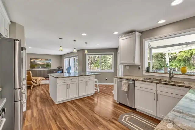 A large 5 x 6 granite island complements this kitchen.