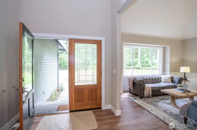 Lovely Entry beckons you to come explore this beautiful Home