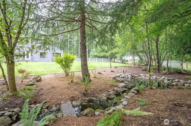 Lovely Water Feature Winds gently through a portion of backyard