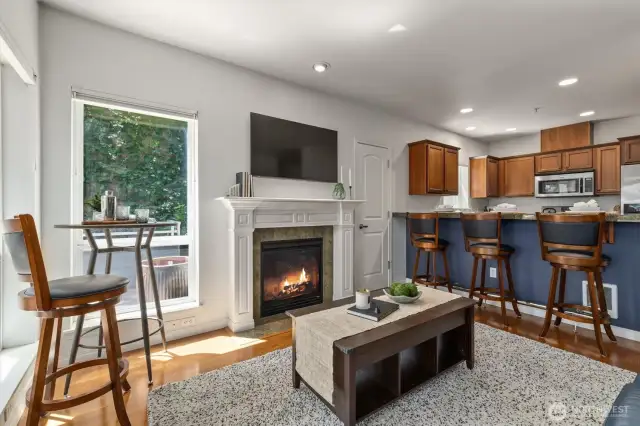 This corner unit is light-filled and surrounded by lush greenery.