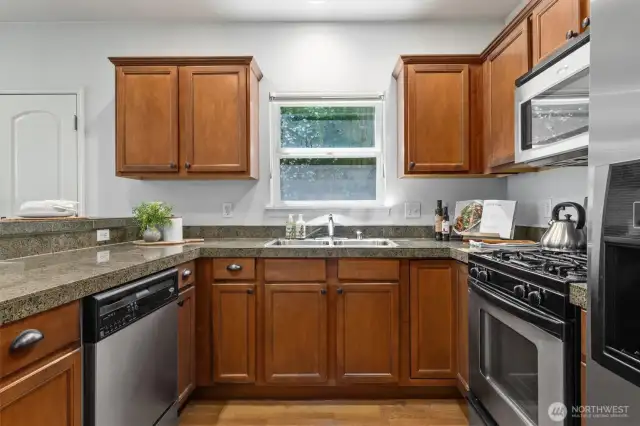 Enjoy a private view out of the kitchen window looking out onto your private deck.
