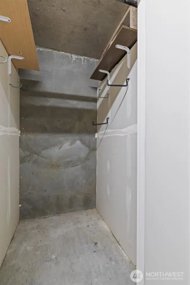 Secure storage is located off the lower-level garage (P102).
