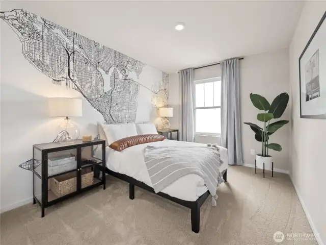 Secondary bedroom showcases a striking city-map mural, ample natural light, and plush carpeting—ideal for guests or a creative retreat. Pictures are for representational purposes only, colors and features may vary.