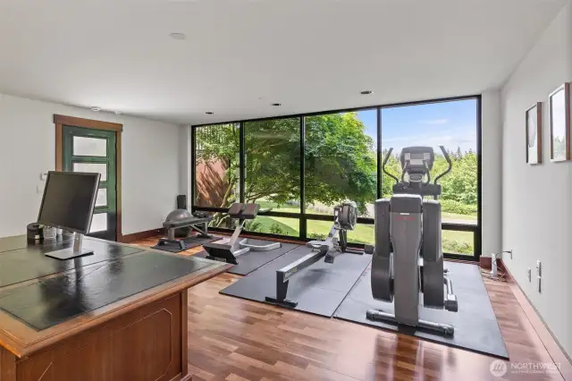 Spacious office with expansive territorial views. The exercise equipment can stay with the house.
