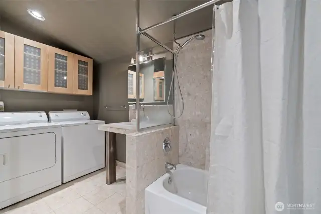 Bath and laundry area above shop